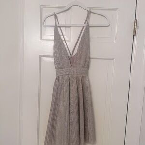 Beautiful deep neck cocktail dress. Only worn once.